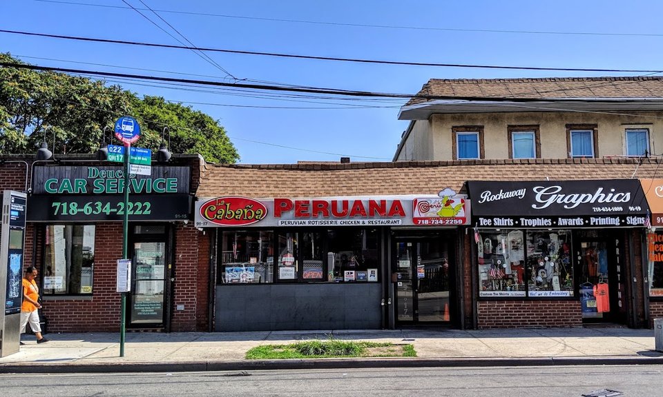 Peruvian dishes on white plates.