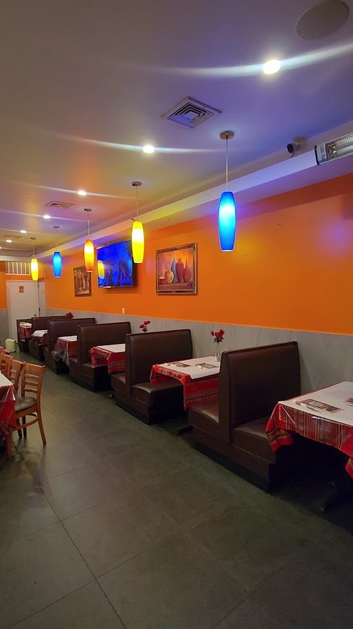 A table with chicken and rice.